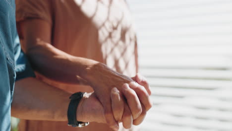 Closeup,-holding-hands-and--senior-couple