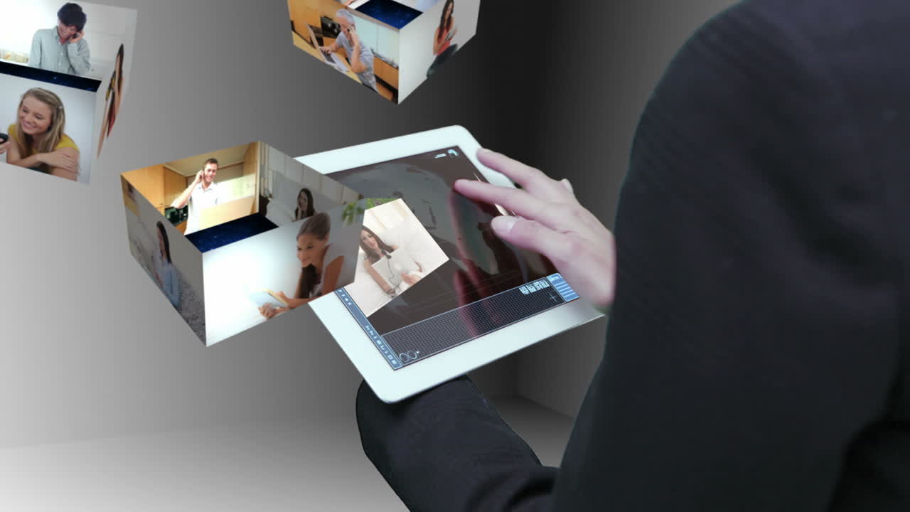 Businesswoman using tablet to view montage of lifestyle clips