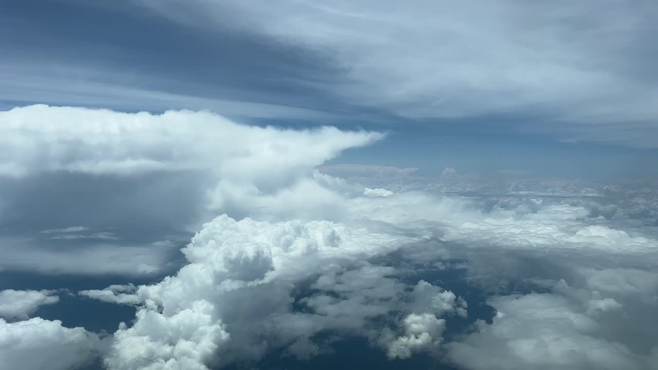 A pilot&rsquo;s point of view while flying in a turbulent sky plenty of storm clouds at 12000m high