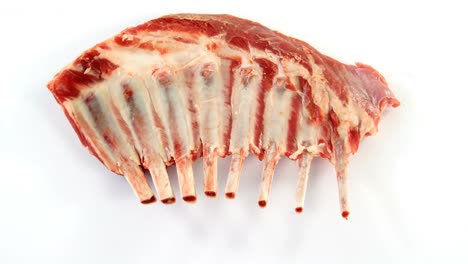 Raw-beef-ribs-on-white-background