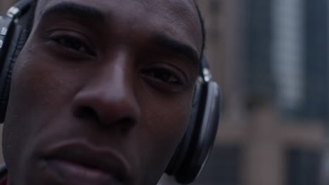 Black-man-wearing-headphones-in-closeup-view-of-face