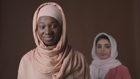 two women in hijabs