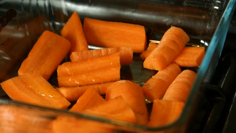 chopped carrots with olive oil drizzled on top