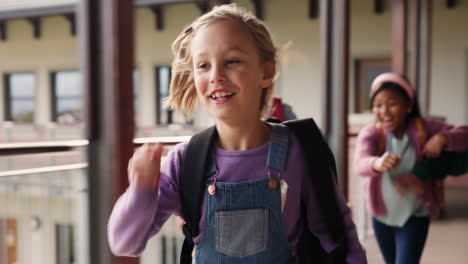 children running in school corridor