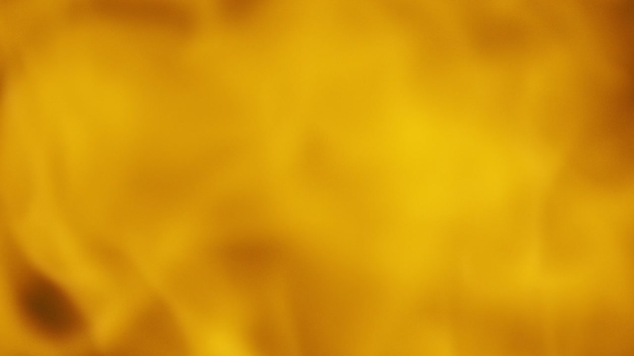 vista impresionante de una impresionante bola de fuego mientras baila con gracia a través del marco en cámara lenta, creando un espectáculo hipnotizante