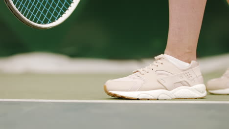 EXTREME-CU-on-feet-of-Caucasian-female-tennis-player-preparing-for-a-serve.-120-FPS-slow-motion,-4K-UHD-RAW-graded-footage