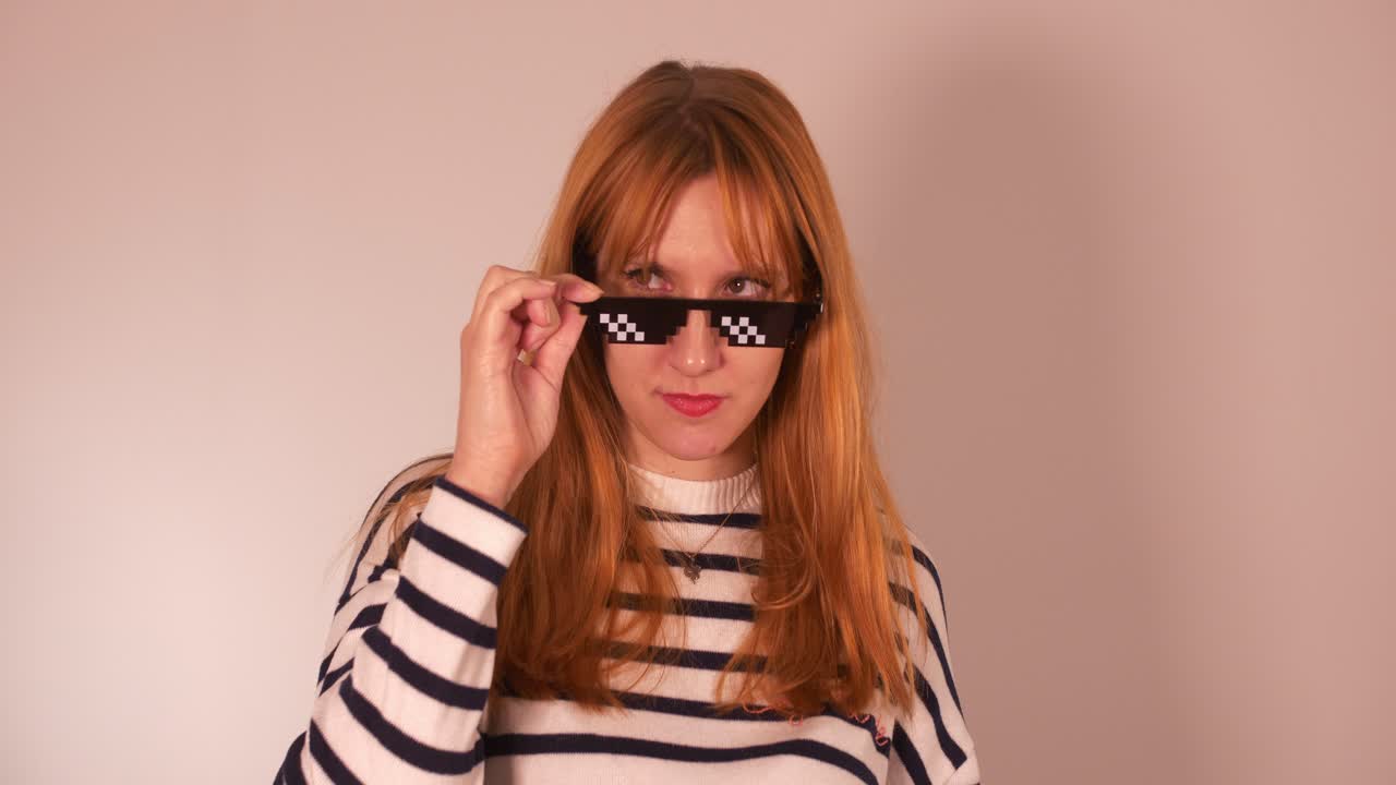 Beautiful Girl with meme glasses, looking all around