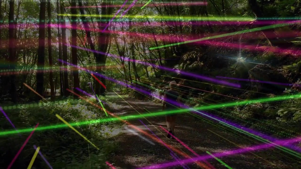 Woman walking woods trail, phone light sparking streaks sweeping over hiker for recreation tech