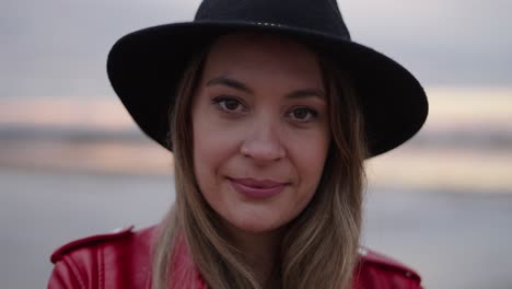 woman in a hat and red jacket