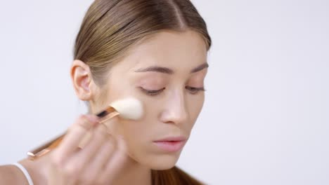 young woman blending contour