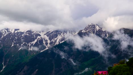 clouds covering a mountain range in a beautiful morning