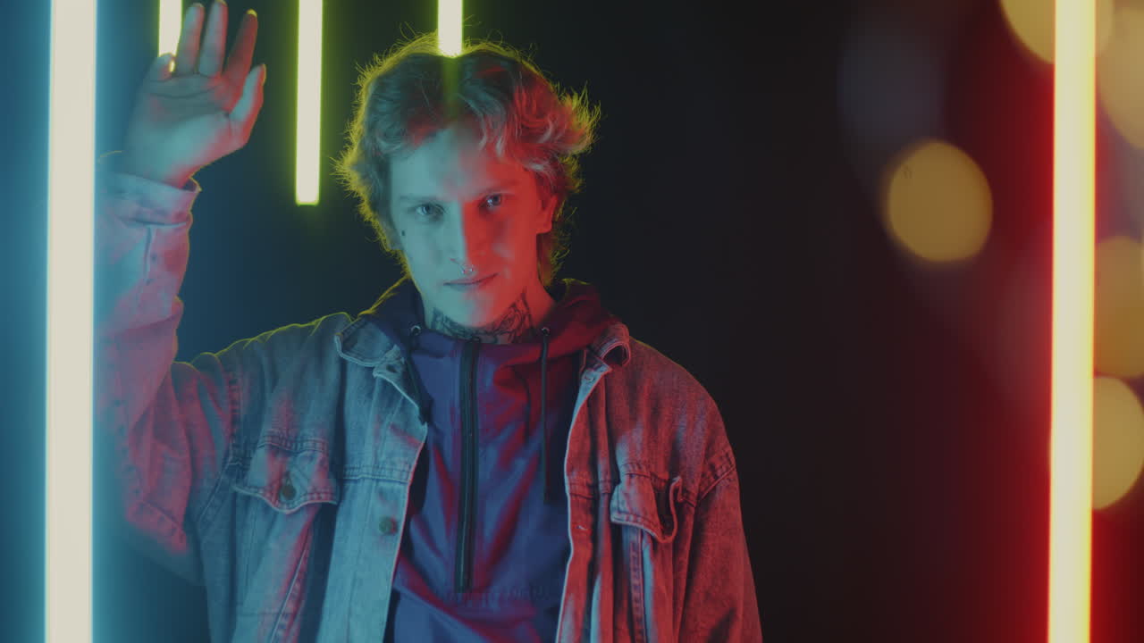 Young Man in Neon Lighting