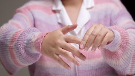 woman hand has office syndrome and relaxation arthritis with self-massage stretching finger reflexology