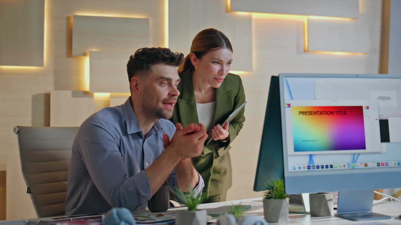 Smiling partners discussing design project in contemporary office close up.