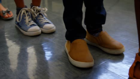 multi-ethnic school kids standing in a classroom at school 4k