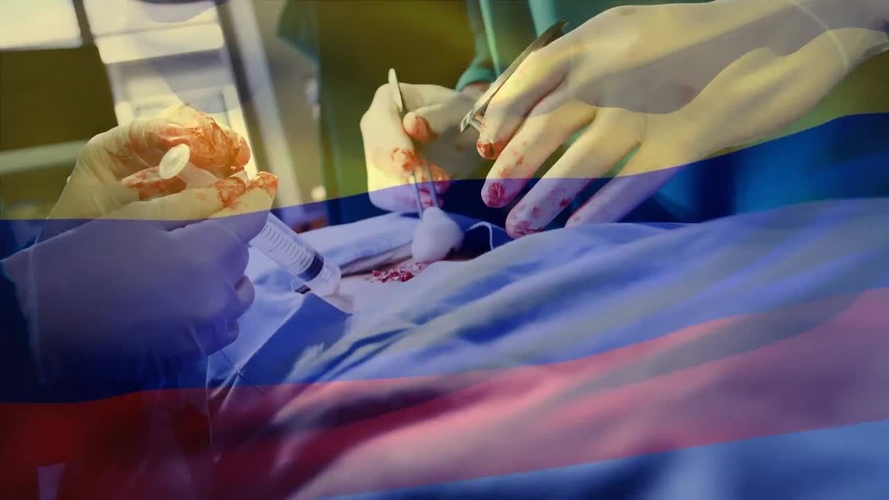 animación de la bandera de cameroon ondeando sobre los cirujanos en el quirófano