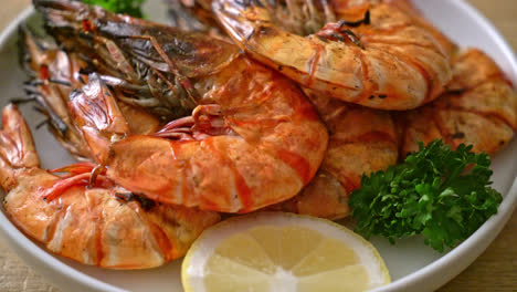 grilled tiger prawns or shrimps with lemon