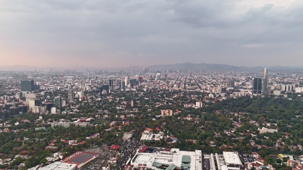 Cloudy afternoon hyperlapse over southern Mexico City, drone view