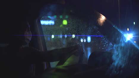 the man in medical mask sitting in the car