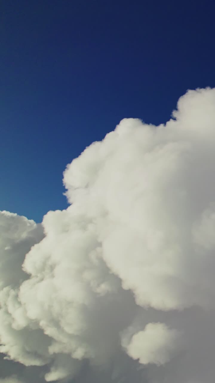 Cumulus Clouds Against a Blue Sky