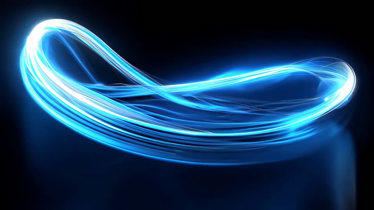 Dynamic swirl of blue light trails on a dark background, captured from a low-angle
