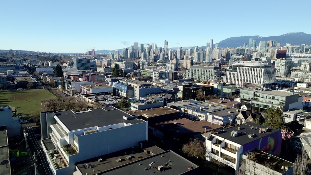 Downtown Vancouver Skyline Seen From Rooftop Of Corporate Office Near Jonathan Rogers Park In Fairview, Canada. - aerial shot