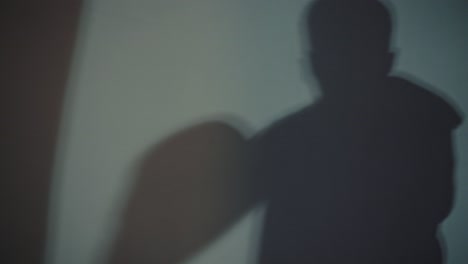 shadow of a person on a wall