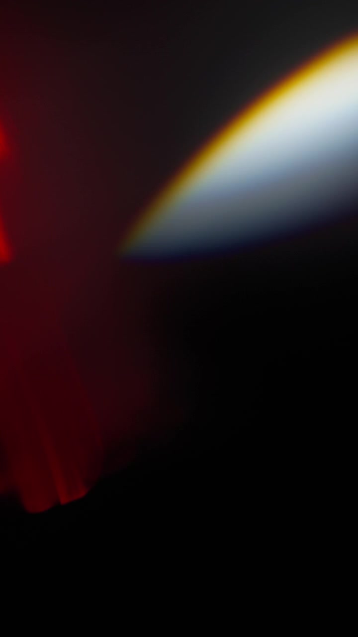 Abstract light leaks created from glass prism reflection with gradient colors