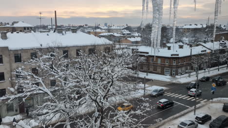 view from home window of winter city in latvia