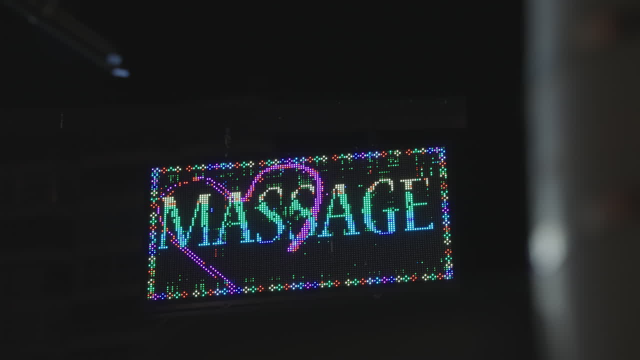 Colorful Flashing LED Sign Displaying Massage