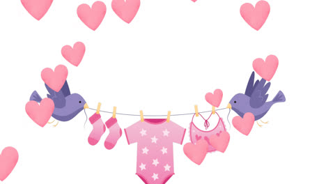 animation of birds holding string with baby clothes over white background with hearts