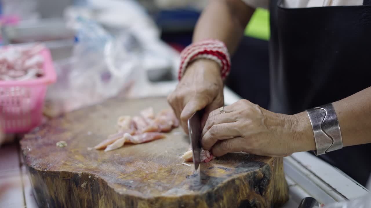 Woman Chopping Meat