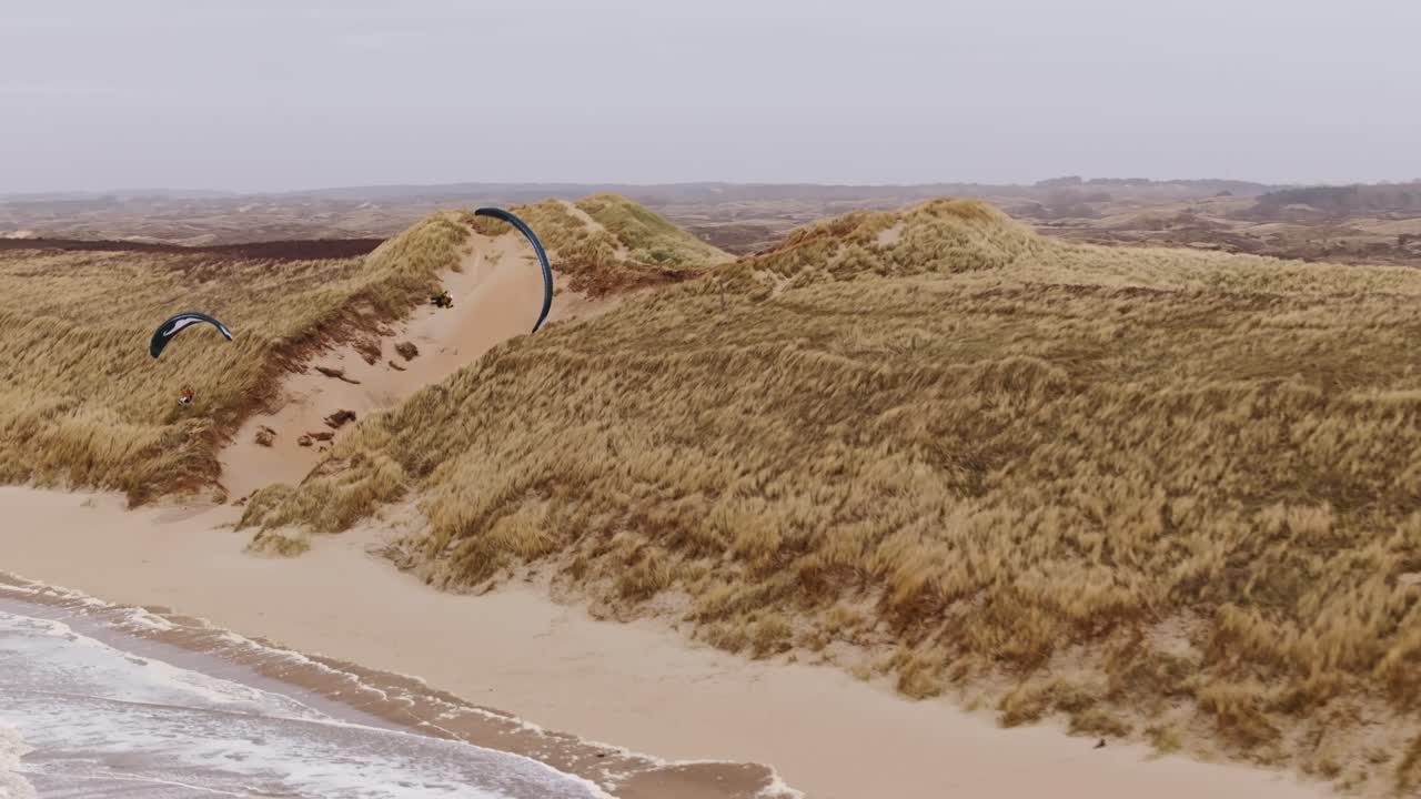 Paragliding over the Sand Dunes at the Coast