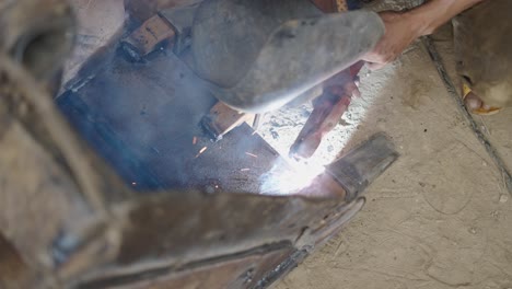 welding repair on excavator bucket