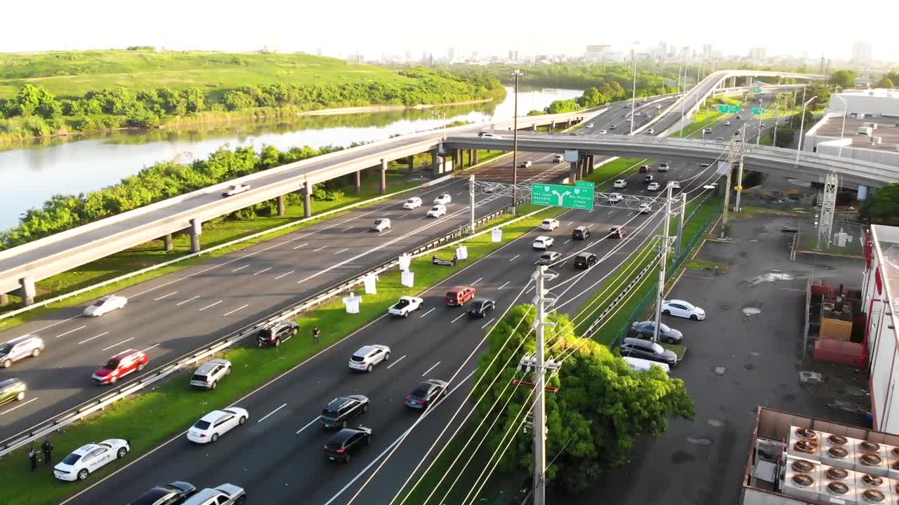 Early Morning Aerial Shot  (Crane Up- Moving Up) Heavy Traffic on Puerto Rico