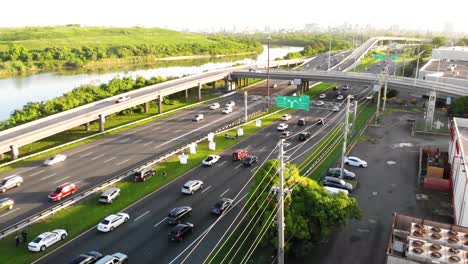 early morning aerial shot  (crane up- moving up) heavy traffic on puerto rico