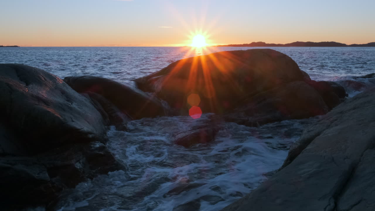 Mysterious Dark Ocean Rippling At Beautiful Golden Sunset Slow motion
