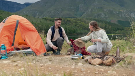 Couple,-camping-and-help-with-tent-in-nature