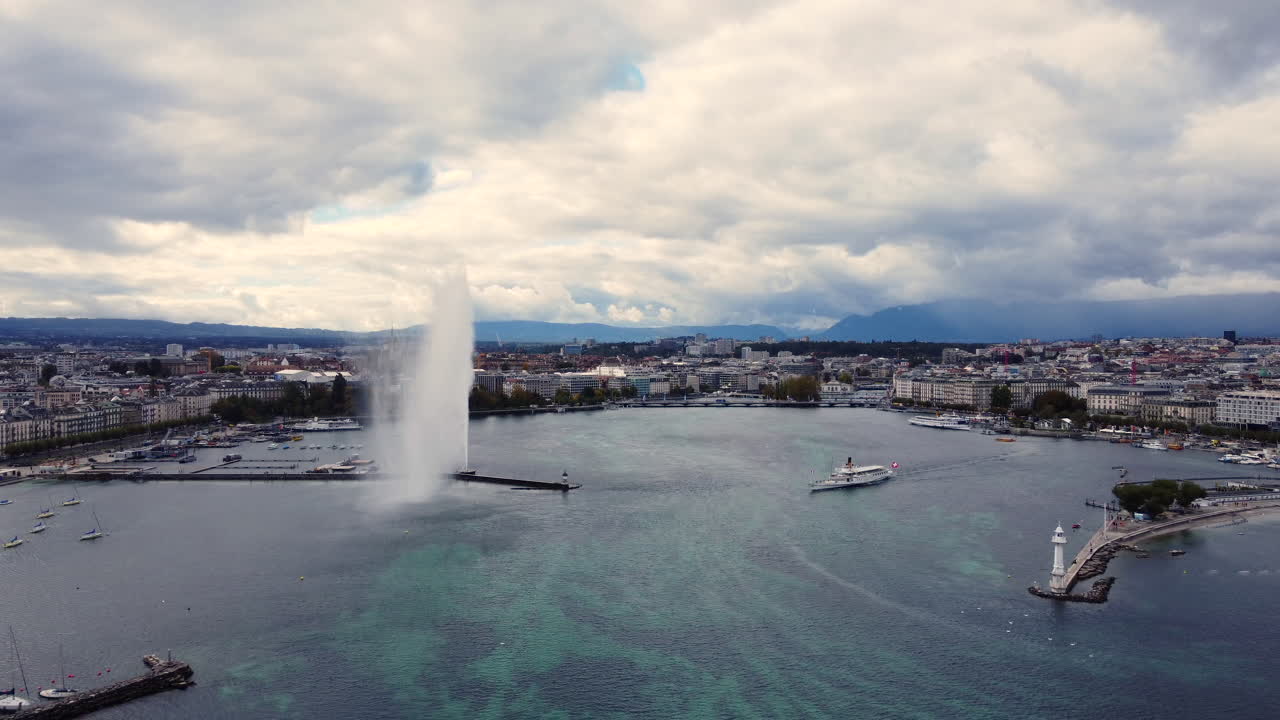 Aerial Pullback Lake Geneva and City with Famous Jet d'Eau Fountain