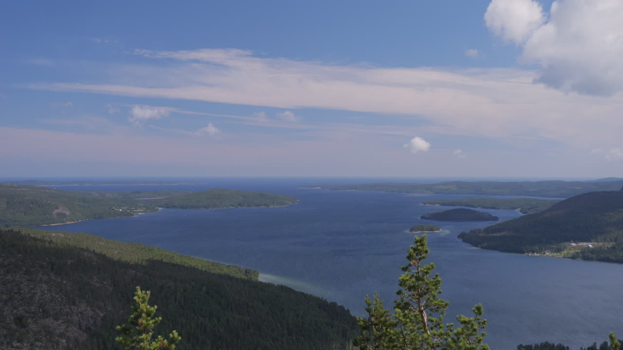 Coastal landscape of Sweden with endless horizon, static view from top mountain