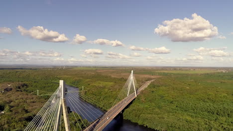 aerial backward rising over mauricio baez bridge, dominican republic