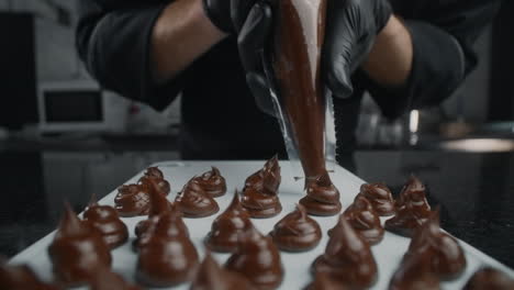 chef making chocolate truffles