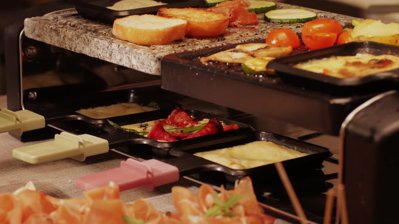 French Swiss or Spanish restaurant with traditional tapas food, Spanish cuisine, delicious tapas and cheese plate, bruschetta with cheese, olives dry tomatoes and tasty sandwich bar appetizer, buffet