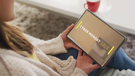 caucasian woman using tablet at home for online shopping, slow motion