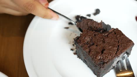 person eating a brownie