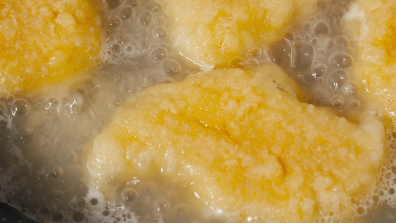Boiled dumplings in a pot