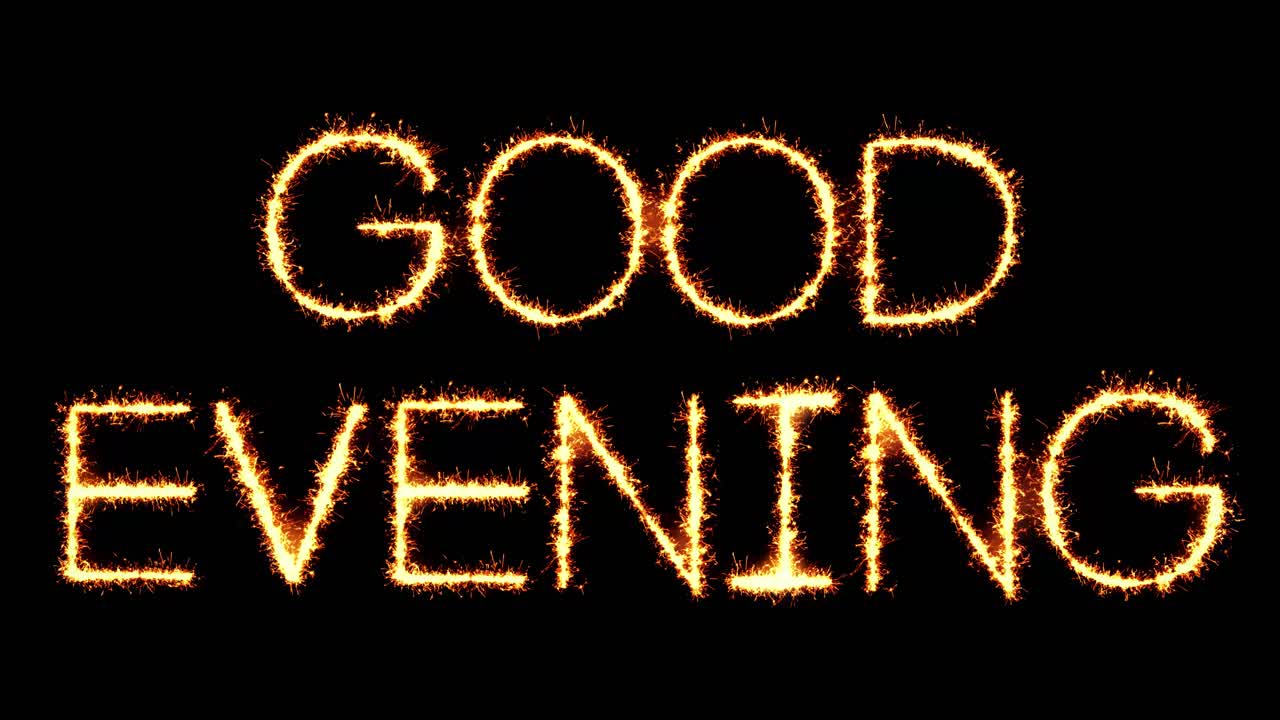 Good evening text sparkler writing with glitter sparks particles firework on black 4k loop