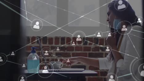 Animation-of-network-of-connections-over-businesswoman-in-office
