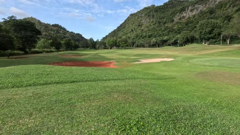 progressive reveal of a lush golf course.