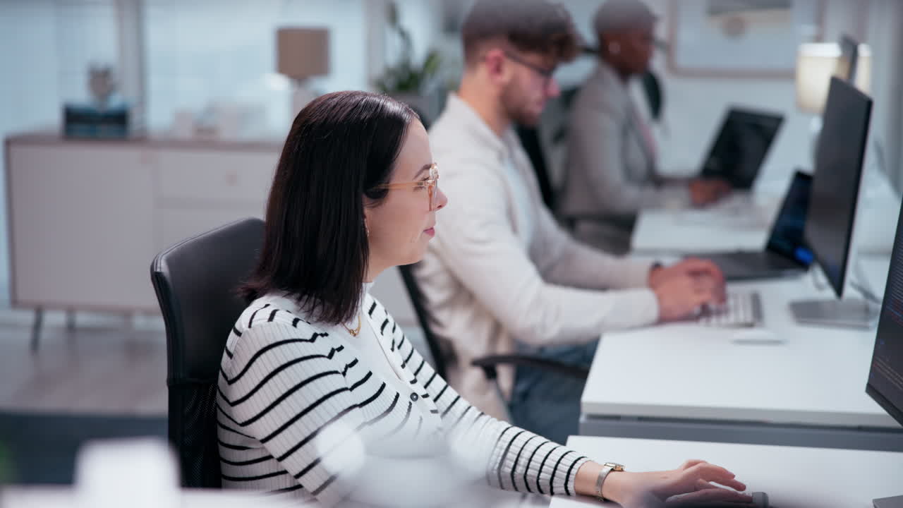 Office workspace with employees working on computers